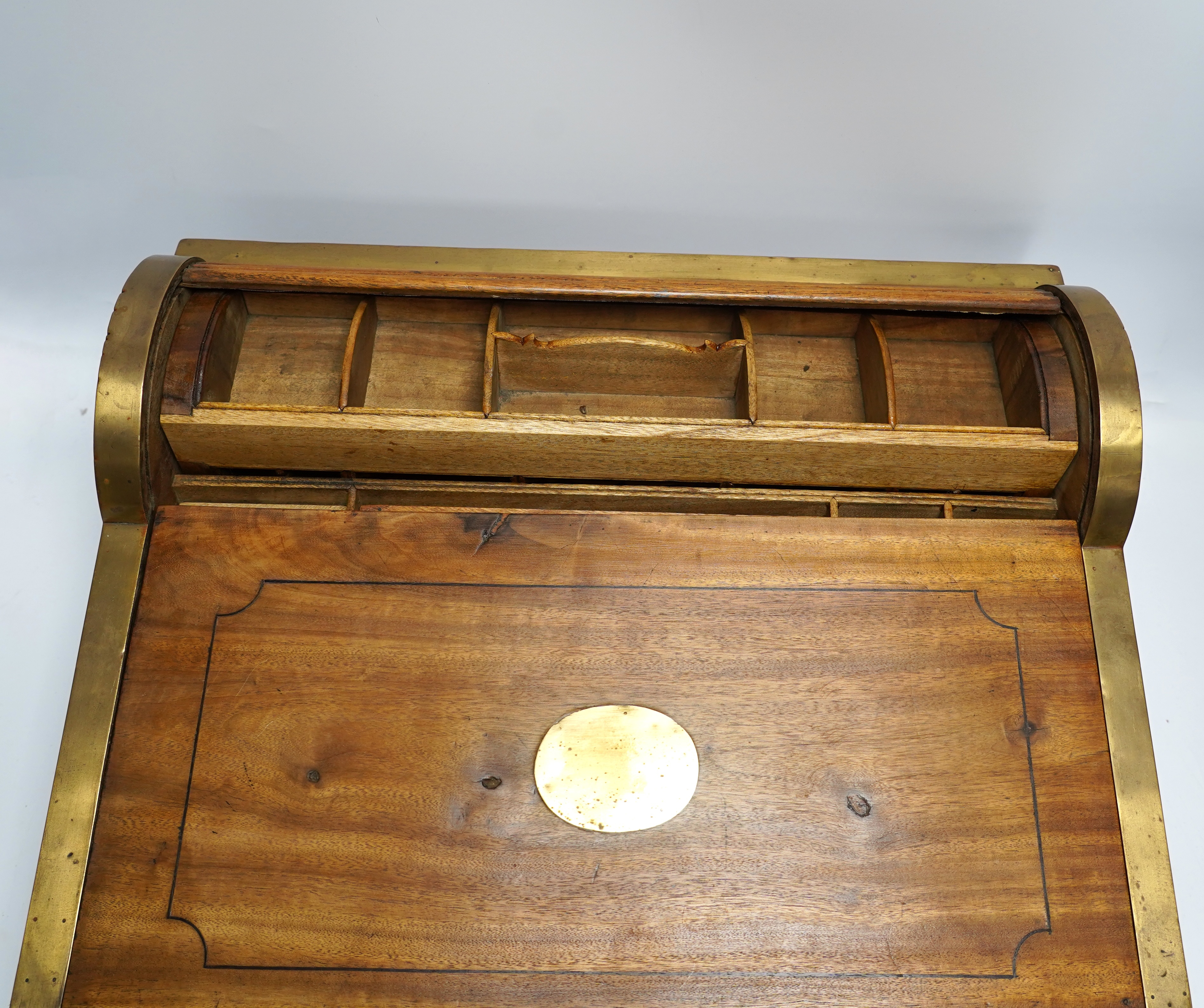 A 19th/20th century Anglo-Indian brass bound camphorwood roll top writing box, 47.5cm wide